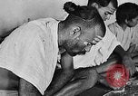 Image of scenes of Indian people at work, school and worship India, 1946, second 23 stock footage video 65675045102