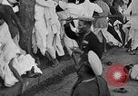 Image of scenes of Indian people at work, school and worship India, 1946, second 36 stock footage video 65675045102