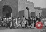 Image of scenes of Indian people at work, school and worship India, 1946, second 39 stock footage video 65675045102