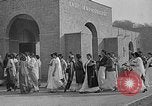 Image of scenes of Indian people at work, school and worship India, 1946, second 40 stock footage video 65675045102