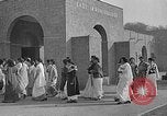 Image of scenes of Indian people at work, school and worship India, 1946, second 41 stock footage video 65675045102