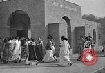 Image of scenes of Indian people at work, school and worship India, 1946, second 42 stock footage video 65675045102