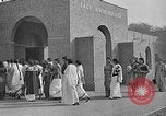 Image of scenes of Indian people at work, school and worship India, 1946, second 43 stock footage video 65675045102