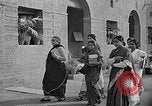 Image of scenes of Indian people at work, school and worship India, 1946, second 44 stock footage video 65675045102