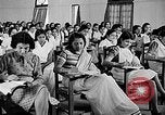 Image of scenes of Indian people at work, school and worship India, 1946, second 53 stock footage video 65675045102