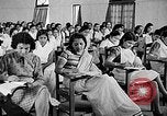 Image of scenes of Indian people at work, school and worship India, 1946, second 54 stock footage video 65675045102