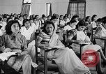 Image of scenes of Indian people at work, school and worship India, 1946, second 55 stock footage video 65675045102