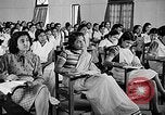 Image of scenes of Indian people at work, school and worship India, 1946, second 56 stock footage video 65675045102