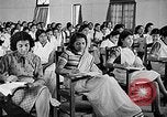 Image of scenes of Indian people at work, school and worship India, 1946, second 57 stock footage video 65675045102