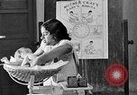 Image of scenes of Indian people at work, school and worship India, 1946, second 58 stock footage video 65675045102