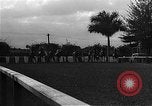 Image of horse race Havana Cuba, 1937, second 8 stock footage video 65675045134