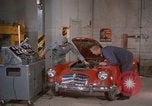 Image of repair a car Alaska USA, 1960, second 3 stock footage video 65675045185