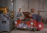 Image of repair a car Alaska USA, 1960, second 4 stock footage video 65675045185