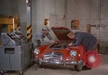 Image of repair a car Alaska USA, 1960, second 10 stock footage video 65675045185