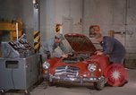 Image of repair a car Alaska USA, 1960, second 11 stock footage video 65675045185