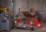 Image of repair a car Alaska USA, 1960, second 13 stock footage video 65675045185