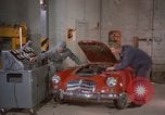 Image of repair a car Alaska USA, 1960, second 17 stock footage video 65675045185