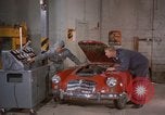 Image of repair a car Alaska USA, 1960, second 18 stock footage video 65675045185