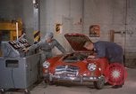 Image of repair a car Alaska USA, 1960, second 20 stock footage video 65675045185