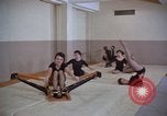 Image of Women exercise in gym Alaska USA, 1960, second 17 stock footage video 65675045187