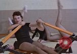 Image of Women exercise in gym Alaska USA, 1960, second 22 stock footage video 65675045187
