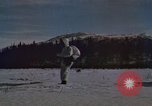 Image of dog sled team Alaska USA, 1960, second 56 stock footage video 65675045190