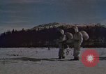 Image of dog sled team Alaska USA, 1960, second 58 stock footage video 65675045190