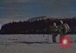 Image of dog sled team Alaska USA, 1960, second 62 stock footage video 65675045190