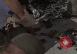Image of clean up Vietnam, 1965, second 34 stock footage video 65675045228