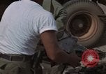 Image of clean up Vietnam, 1965, second 36 stock footage video 65675045228
