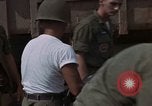 Image of clean up Vietnam, 1965, second 39 stock footage video 65675045228