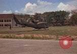 Image of Army UH-1B with red cross Vietnam, 1965, second 10 stock footage video 65675045232