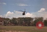 Image of Army UH-1B with red cross Vietnam, 1965, second 17 stock footage video 65675045232