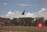 Image of Army UH-1B with red cross Vietnam, 1965, second 18 stock footage video 65675045232