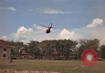 Image of Army UH-1B with red cross Vietnam, 1965, second 19 stock footage video 65675045232