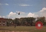 Image of Army UH-1B with red cross Vietnam, 1965, second 22 stock footage video 65675045232