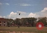 Image of Army UH-1B with red cross Vietnam, 1965, second 23 stock footage video 65675045232