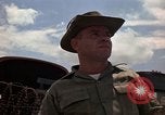 Image of Army UH-1B with red cross Vietnam, 1965, second 28 stock footage video 65675045232