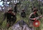 Standbild USA1st Kavallerie Division Vietnam, 1965, aus Sekunde 23 historischem Filmmaterial Videoclip 65675045331