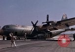 Image of crashed C-130B Vietnam, 1967, second 10 stock footage video 65675045356