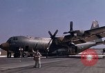 Image of crashed C-130B Vietnam, 1967, second 12 stock footage video 65675045356