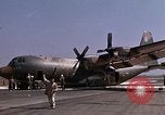 Image of crashed C-130B Vietnam, 1967, second 14 stock footage video 65675045356