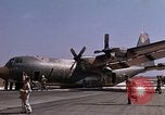 Image of crashed C-130B Vietnam, 1967, second 16 stock footage video 65675045356
