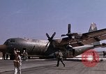 Image of crashed C-130B Vietnam, 1967, second 17 stock footage video 65675045356