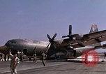 Image of crashed C-130B Vietnam, 1967, second 18 stock footage video 65675045356