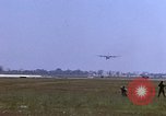 Image of crashed C-130B Vietnam, 1967, second 52 stock footage video 65675045357