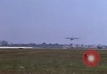 Image of crashed C-130B Vietnam, 1967, second 55 stock footage video 65675045357