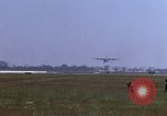 Image of crashed C-130B Vietnam, 1967, second 56 stock footage video 65675045357