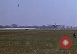 Image of crashed C-130B Vietnam, 1967, second 62 stock footage video 65675045357