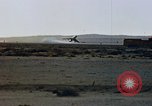Image of crash of F-100 Supersabre jet caught in "sabre dance" California USA, 1956, second 10 stock footage video 65675045358